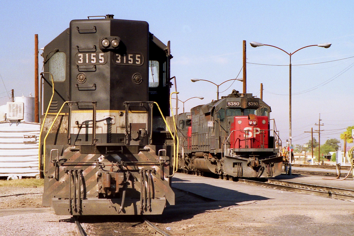 SP 8380 is a class EMD SD40T-2 and  is pictured in Tucson, Arizona, USA.  This was taken along the Lordsburg/SP on the Southern Pacific Transportation Company. Photo Copyright: Rick Doughty uploaded to Railroad Gallery on 04/23/2024. This photograph of SP 8380 was taken on Tuesday, March 07, 1989. All Rights Reserved. 